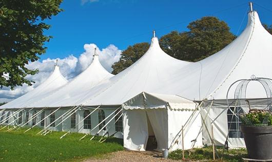 a line of sleek and modern portable restrooms ready for use at an upscale corporate event in Bloomfield, NJ