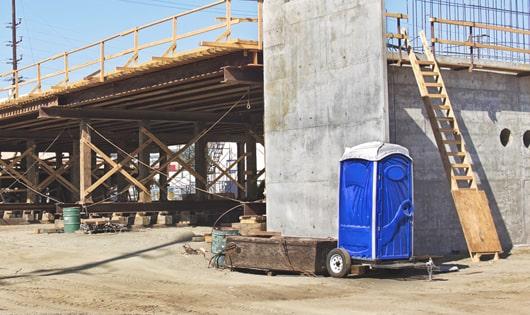 easily accessible portable restrooms at a job site, saving workers from long walks to a permanent restroom